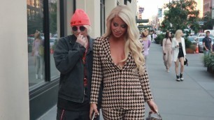 'Gigi Gorgeous and Nats Getty kiss while posing for photogs in NYC'